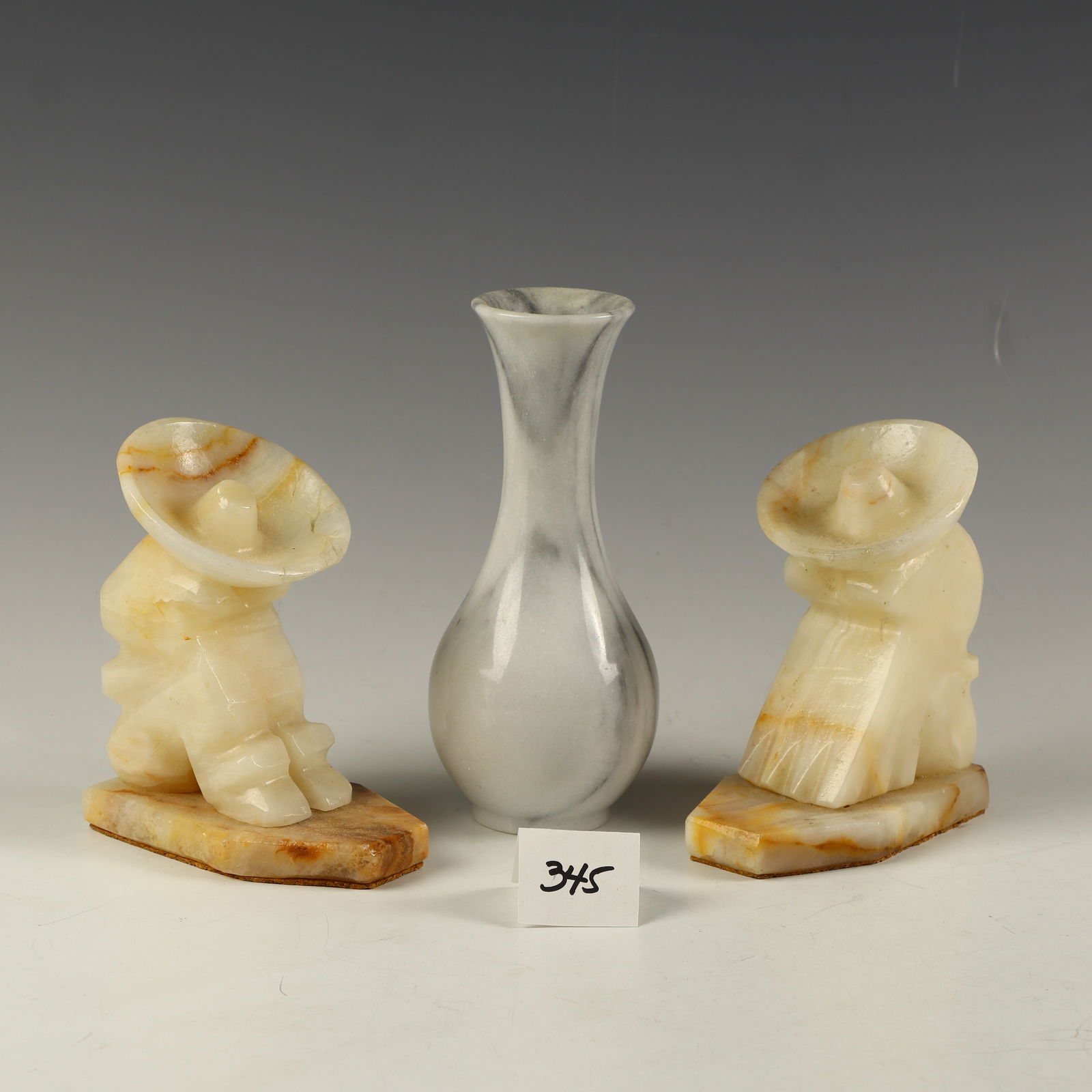 Marble set of bookends and a marble vase: Marble set of bookends 5 inches tall and a marble vase 7 inches tall