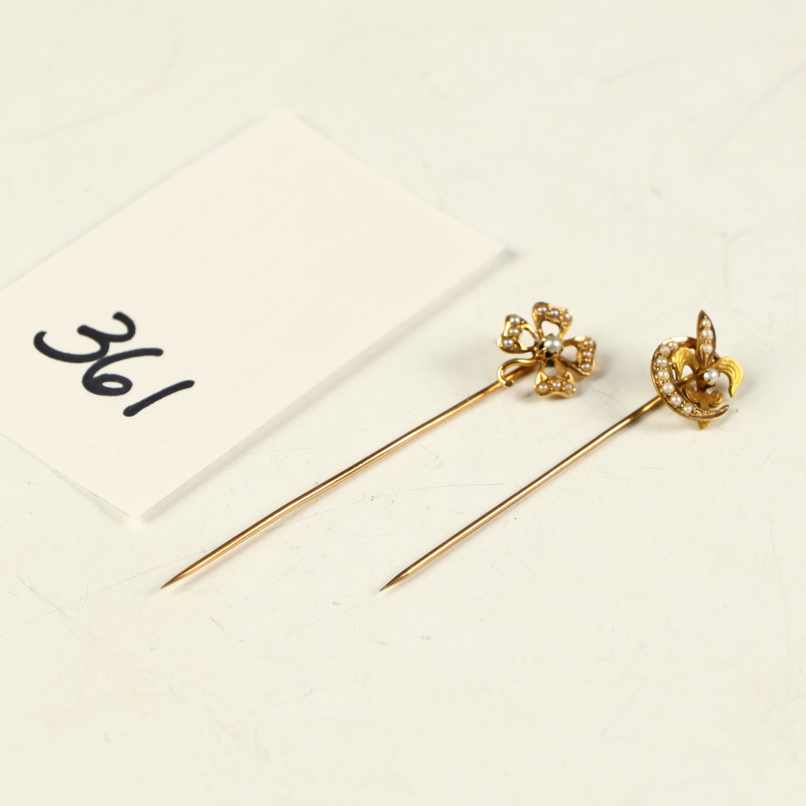 Two antique 14K gold seed pearl stick pins 2.4 gms: Two antique 14K gold seed pearl stick pins 2.4 gms, 2 and 2.5 lengths