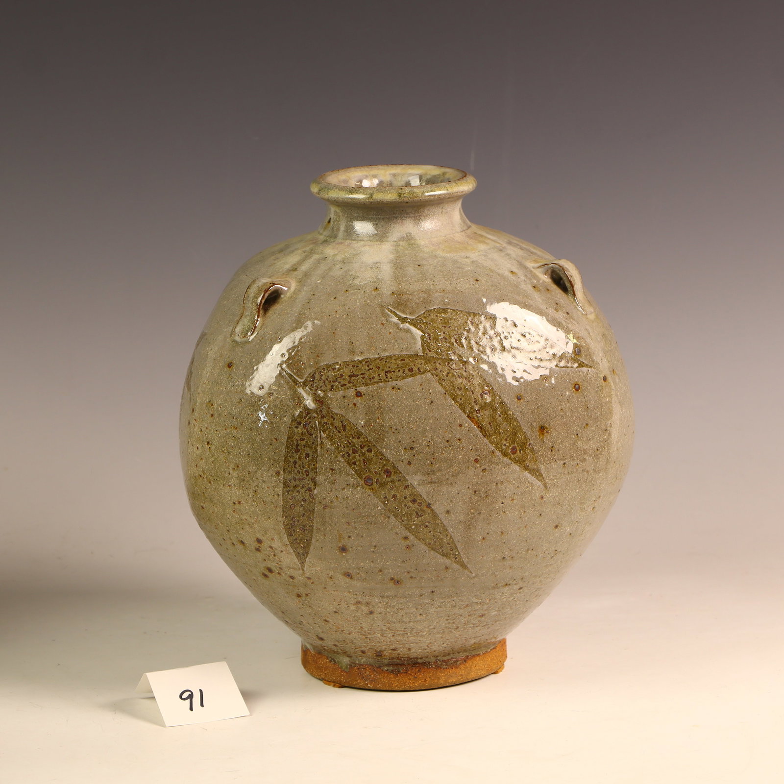 Signed Studio Pottery Maple, bamboo, and Lotus leaves design jar (1 of 3)