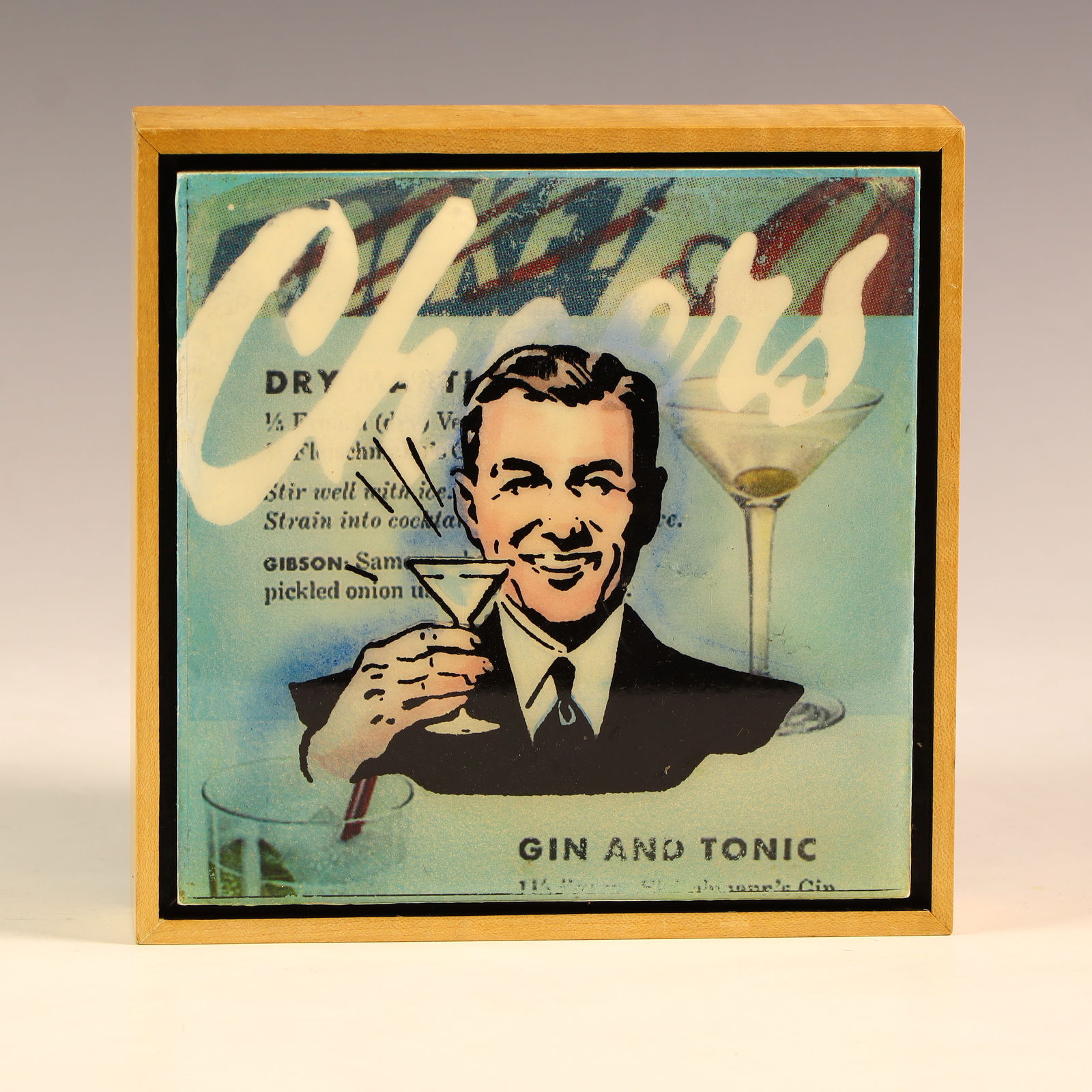 Graphic on pottery tile by Jeff Schaller titled Cheers: Graphic on pottery tile by Jeff Schaller titled Cheers 6 ¾ X 6 ¾ inches