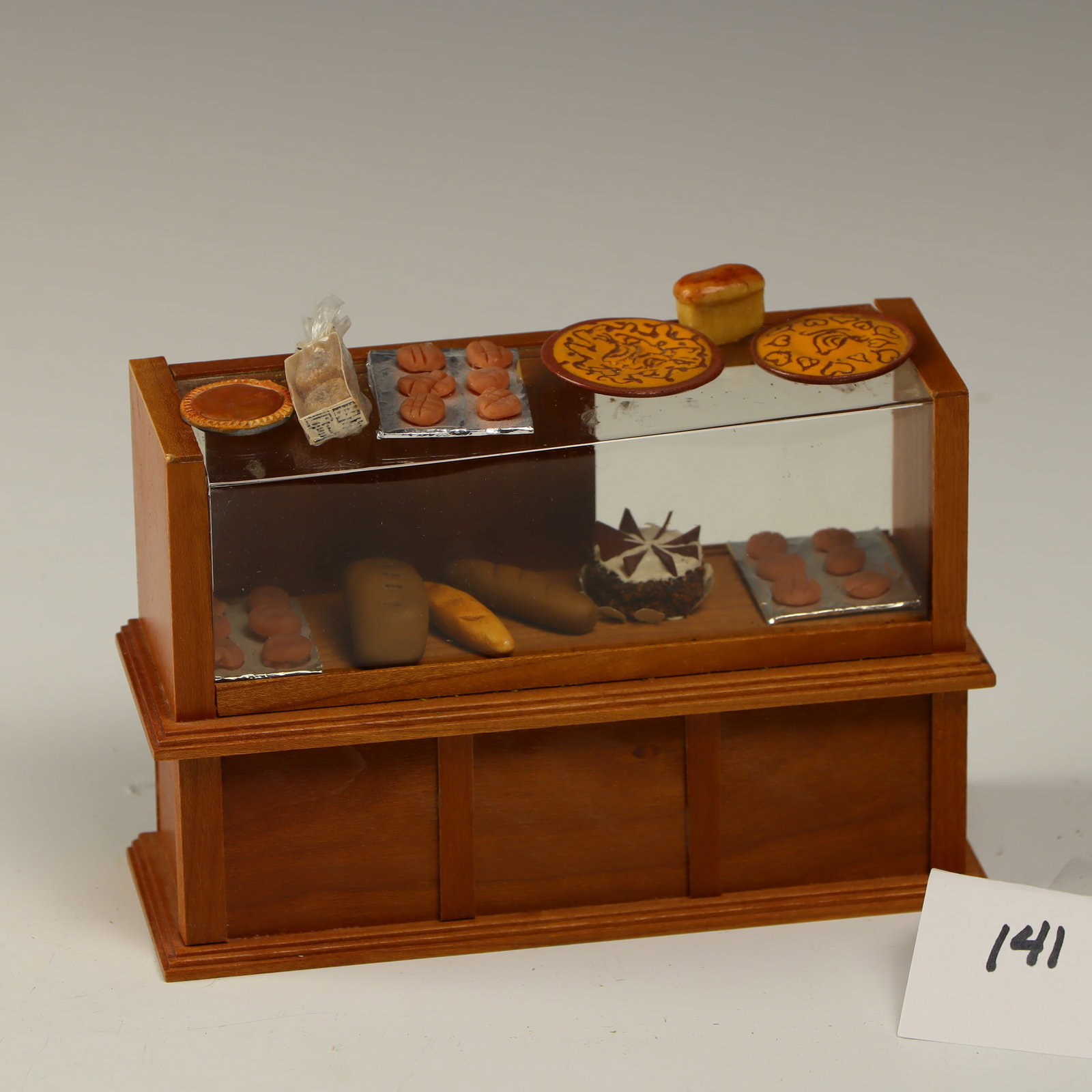 Vintage Miniature Bread and pies stand: Miniature Bread and pies stand, 4 inches tall, 5.5 inches length, 2 inches depth
