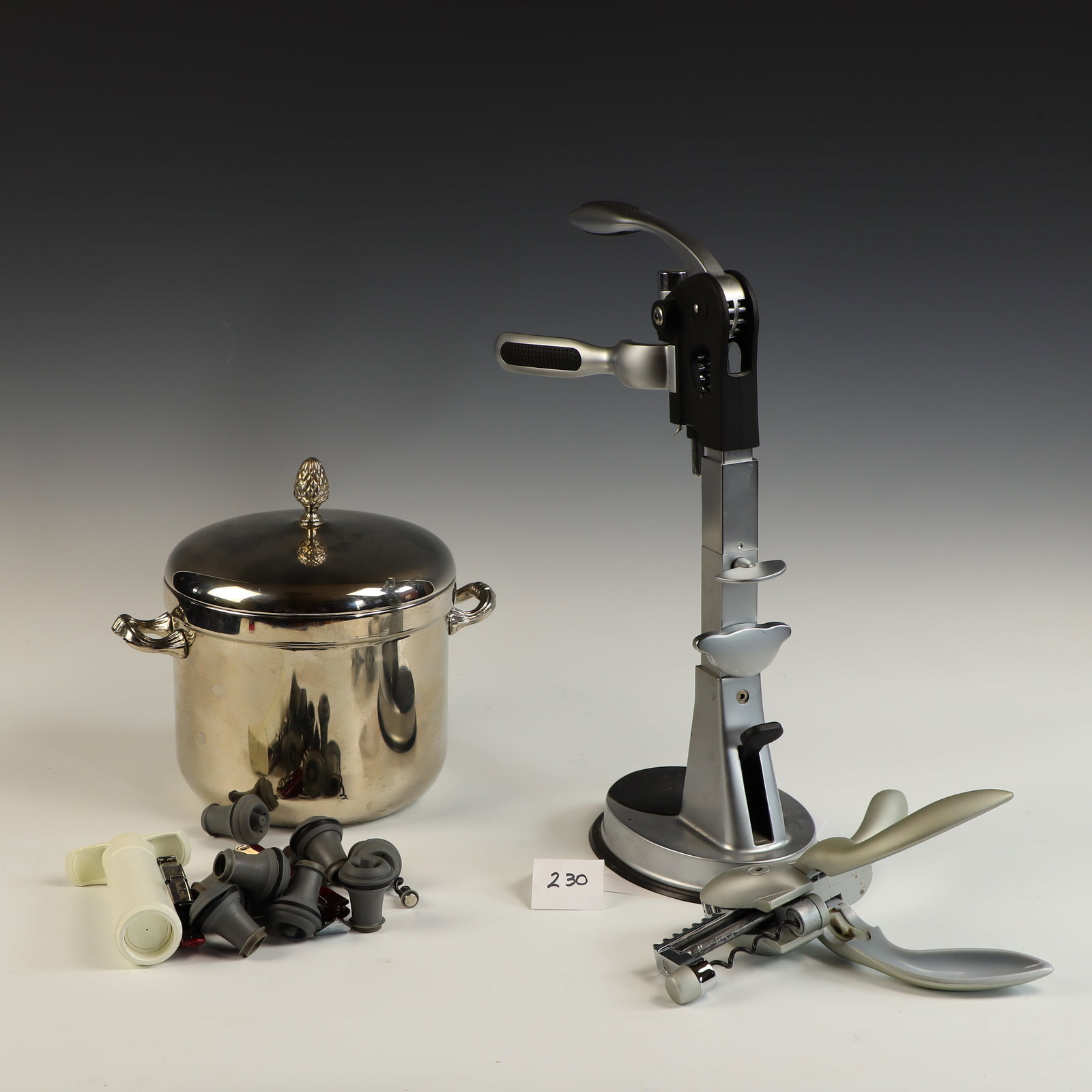 Wine bottle press and bottle openers: Wine bottle press and bottle openers, also includes Power Pourer OXO, and ice bucket 9 inches tall, 7 inches wide with handles