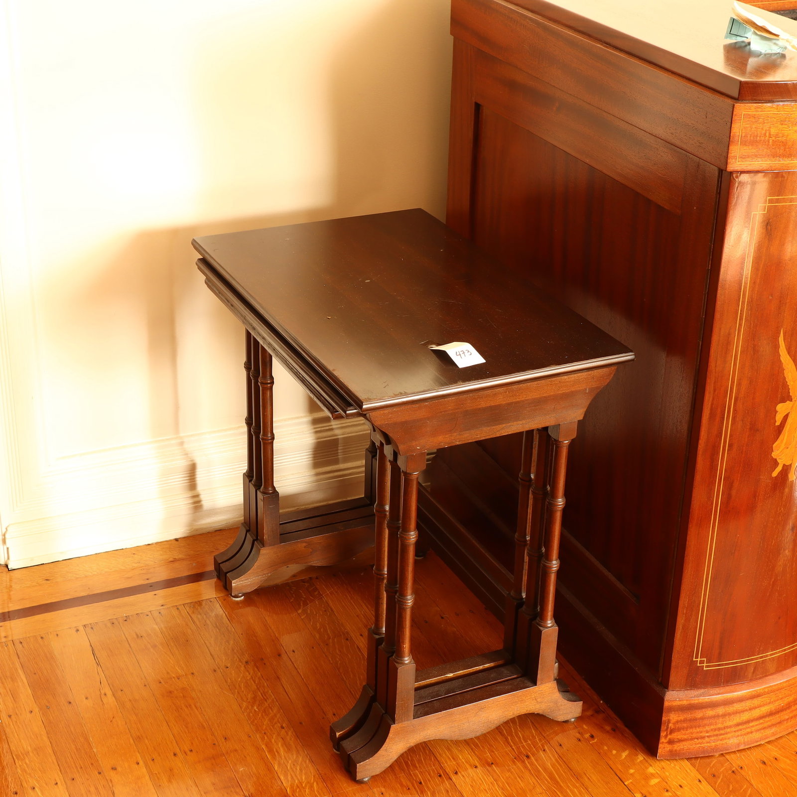 Nesting tables: Nesting tables largest is 23X14.5X22 inches tall, has wear and scratches