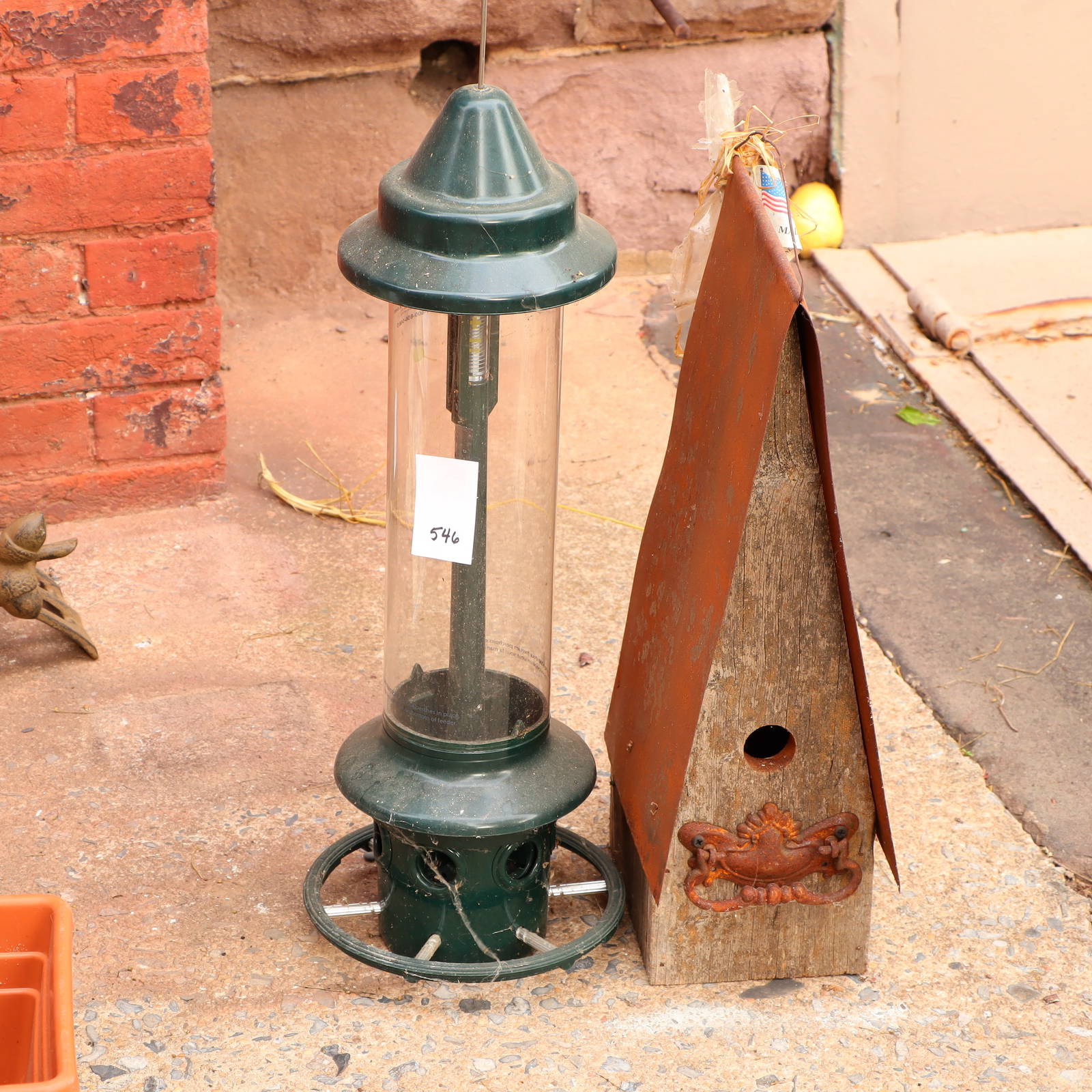 Bird Feeder And A Tall Bird House Auction