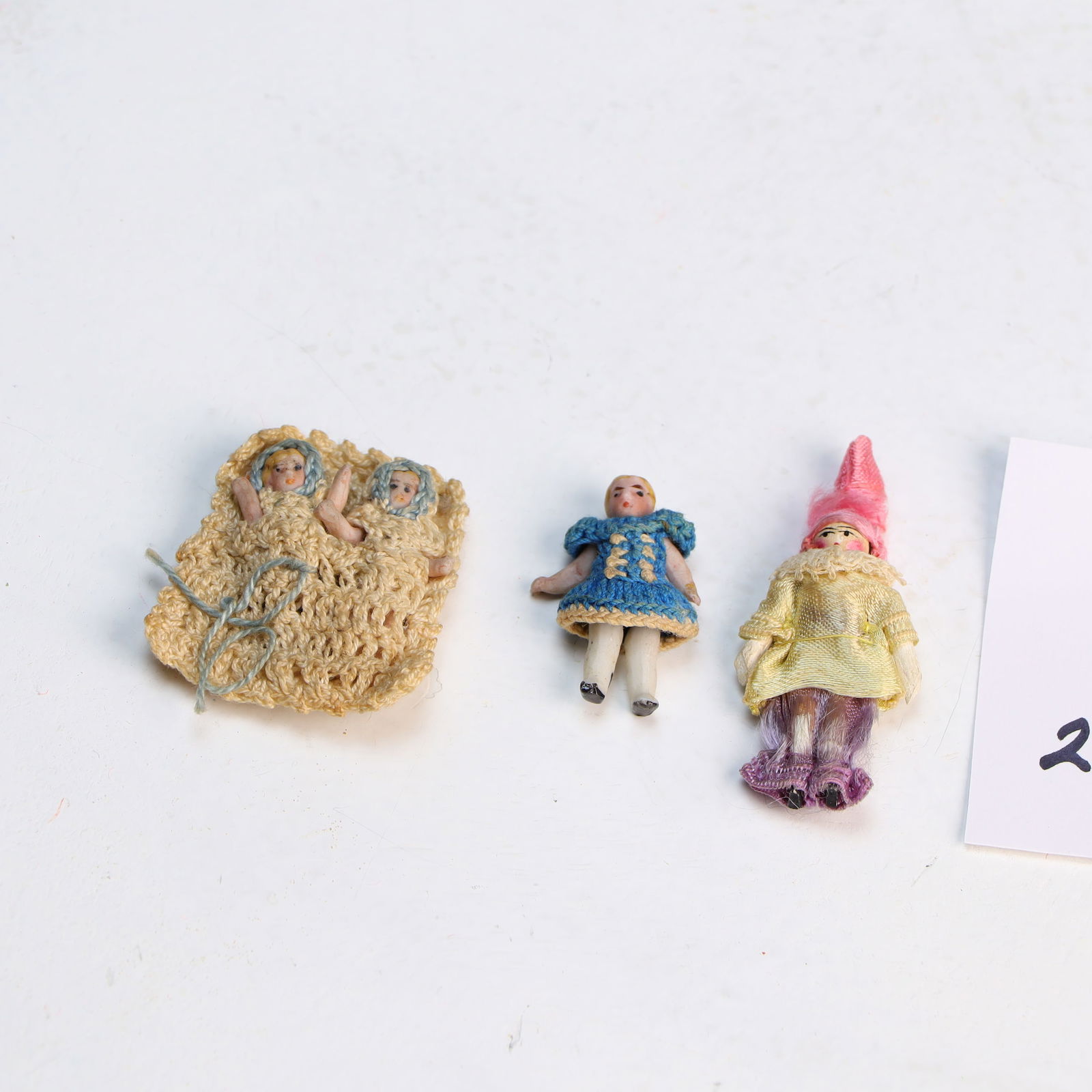 Lot of 4 miniature porcelain dolls (1 of 2)