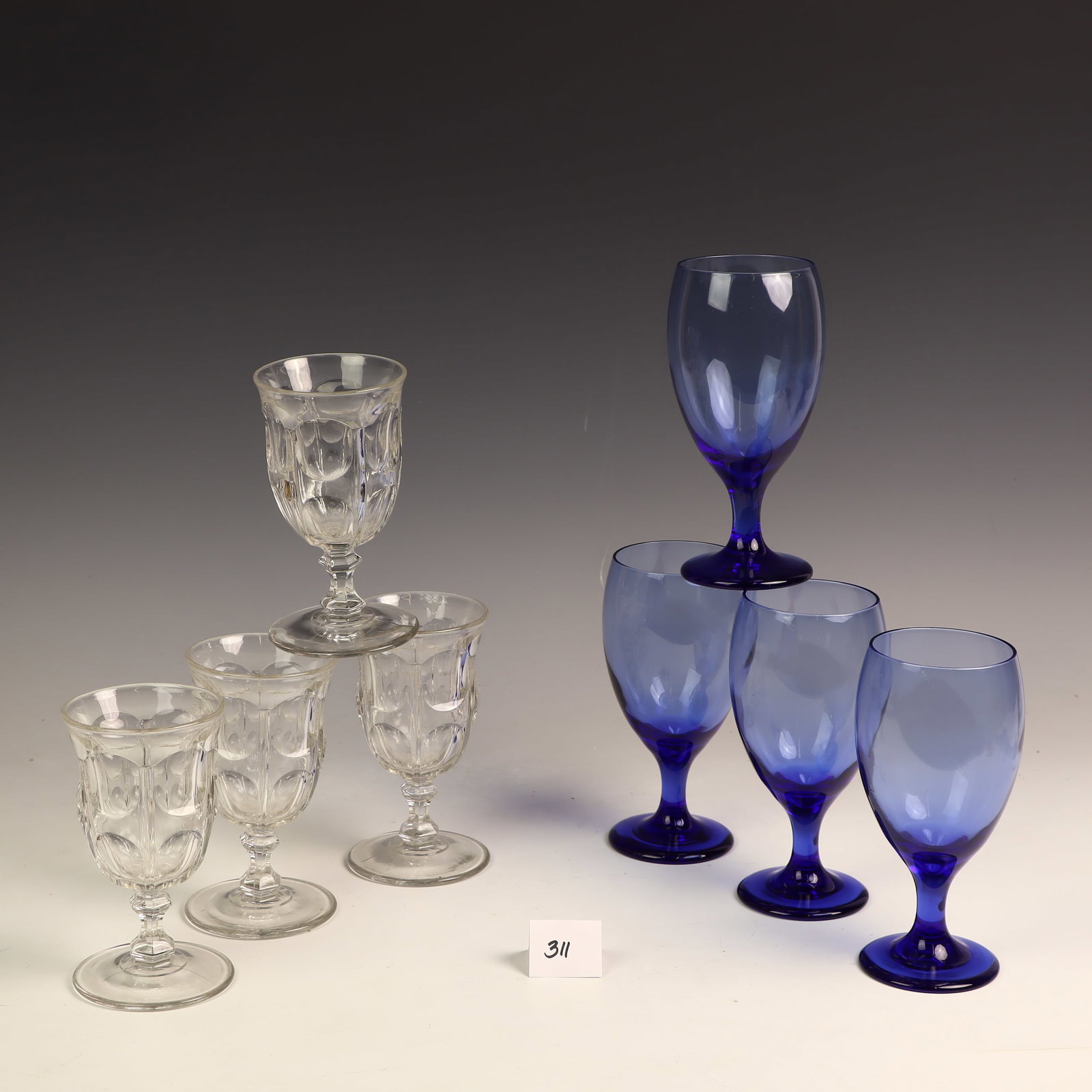 Vintage Blue water/cocktail glasses and four vintage glasses: Vintage Blue water/cocktail glasses 7X3 inches and four vintage glasses 6X3 inches in very good condition