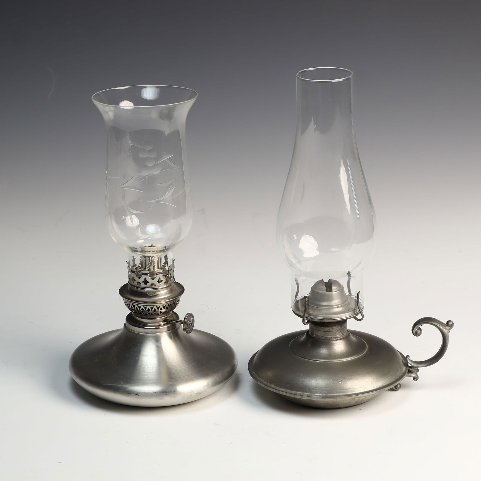 Two Pewter glass coasters: Two Pewter glass coasters, Fred Danforth is 11X6 inches, International Pewter with handles 11X6 inches