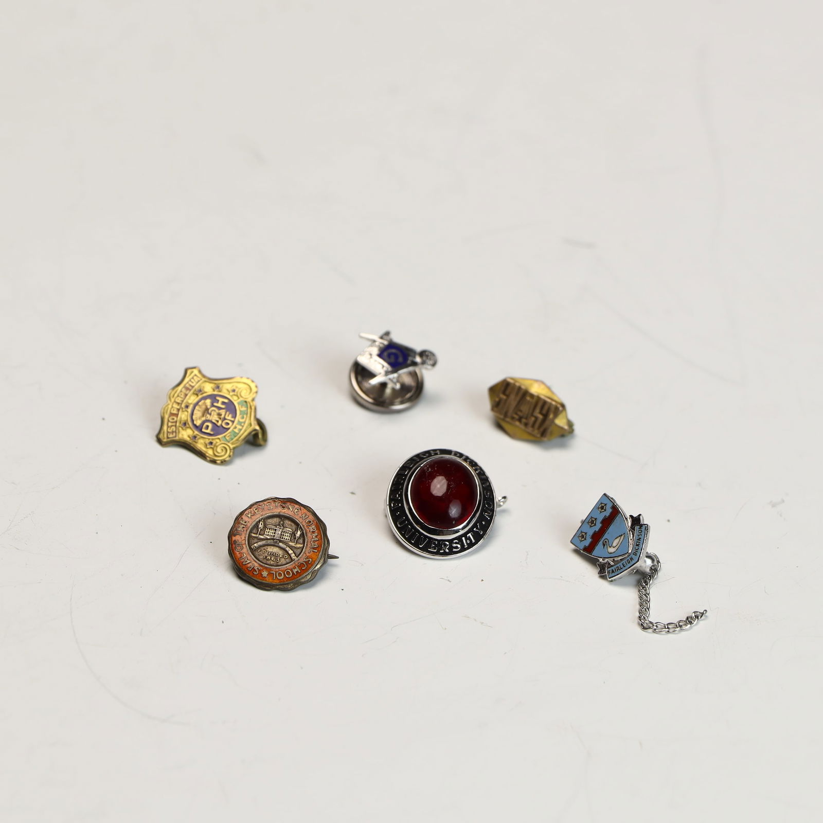 Lot of 14K, 10K, and sterling silver pins: Lot of 14K gold, 10K gold, and 3 sterling silver pins