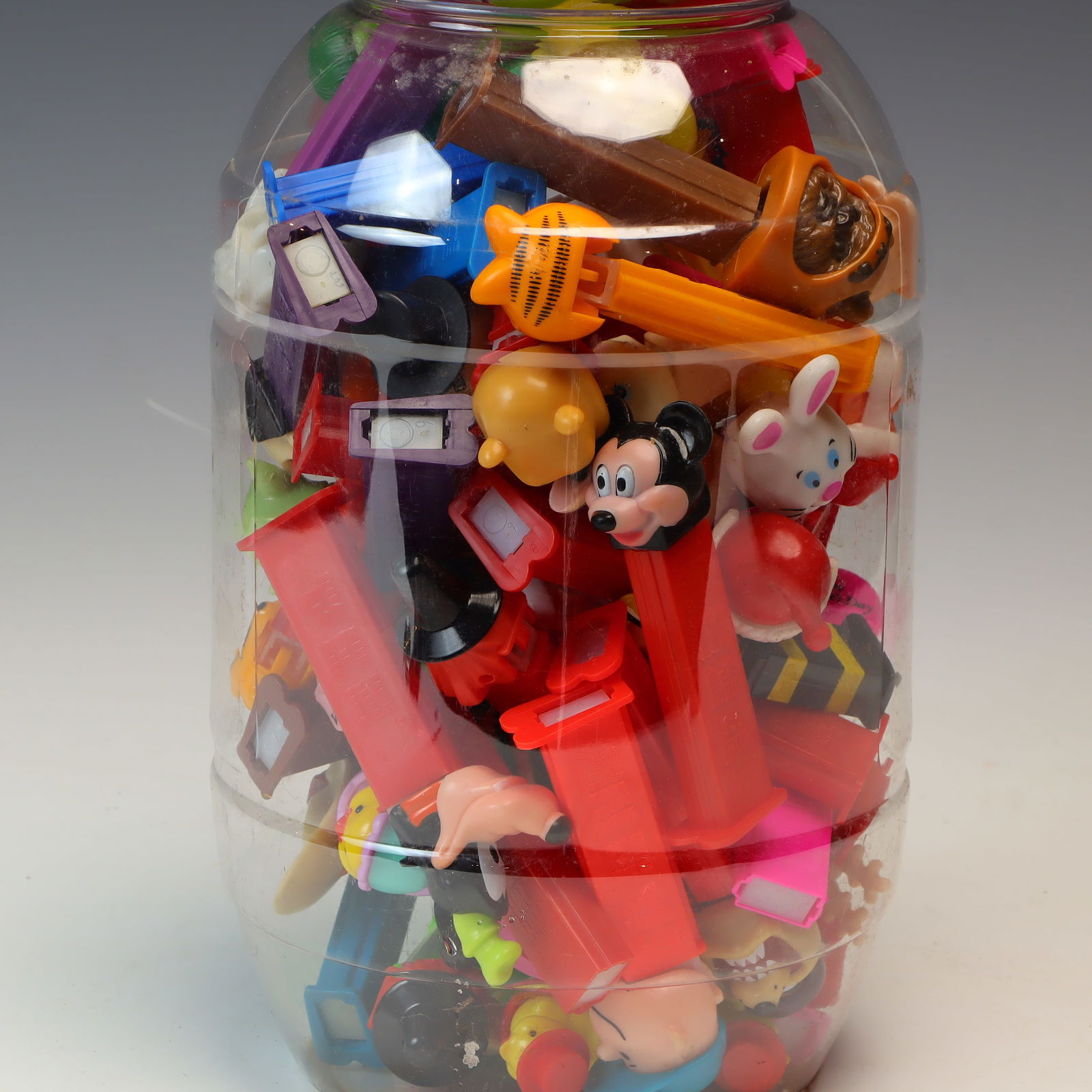 Lot of Pez dispensers in a plastic container (1 of 4)