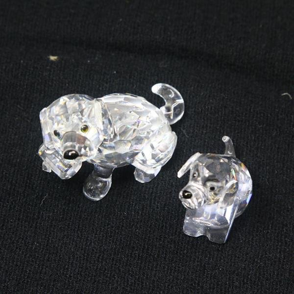 Pair of Swarovski Crystal St. Bernard Puppy Dog: 2 dog figures signed on base with Swarovski swan largest is 1.5 in. tall by 2 in. wide