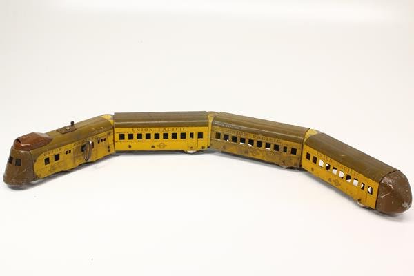 Vintage Hafner Overland Flyer M-10000 Tin Train Set: wind up articulating Union Pacific locomotive with 3 cars & many pieces of track. Wind up works