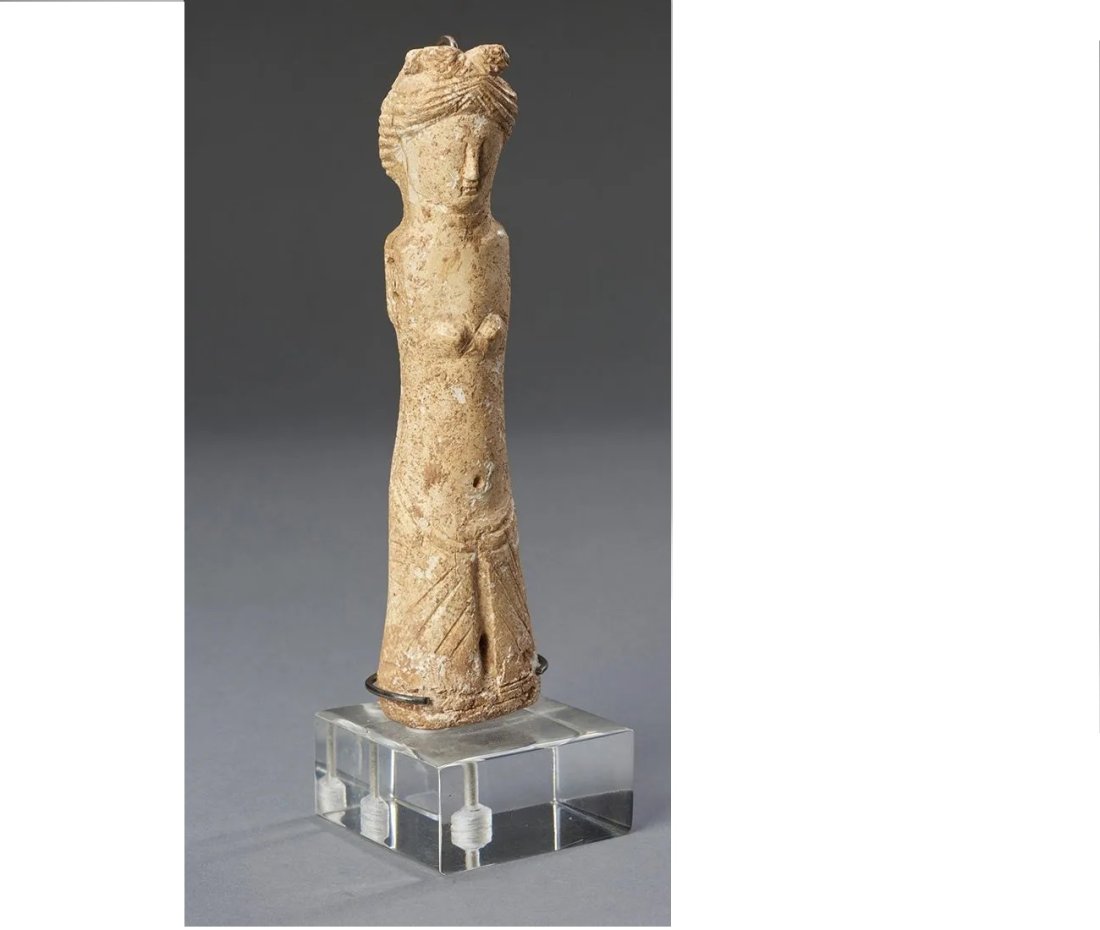 Roman Bone Carved Doll of Aphrodite.: Roman Bone Carved Doll of Aphrodite,Ca. 1st-2nd century A.D. Carved bone stylized female doll having nicely rendered facial details, with bosom exposed and wearing a crown diadem and pleated skirt. Ar
