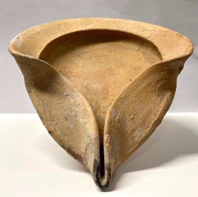Large Holy Land Iron Age IIC Oil Lamp: Ancient Near East, Holy Land / Levant, Iron Age, ca. 1200 BC 1000 BCE. made from a coarse clay, in a saucer shape with a narrow, pinched spout and a shallow bowl, Intact Size: 16.5cm x 14 cm Ex privat
