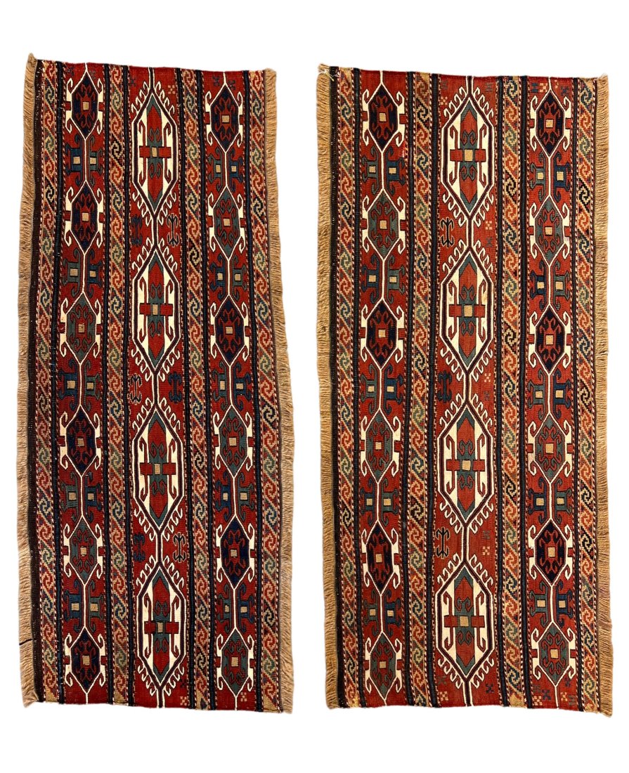 Pair of Antique Shahzavan Sumak Bag Face Cushions: Pair of antique Shahzavan Sumak bag face Cushions. Mid 19th century. Wool on a wool foundation. Size of each: 110 cms x 47 cms (43 ins x 18 ins). Please note: this Lot can be viewed in person at The O