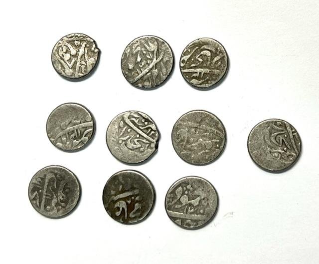 Lot of 10 Islamic Solid Silver Mughal Empire Coin: Lot of 10 Islamic Solid Silver Mughal Empire Coin . Size 16 mm diameter 31grem in total. This Lot is held at Heritage of Civilization Gallery in the US and ships from this address.