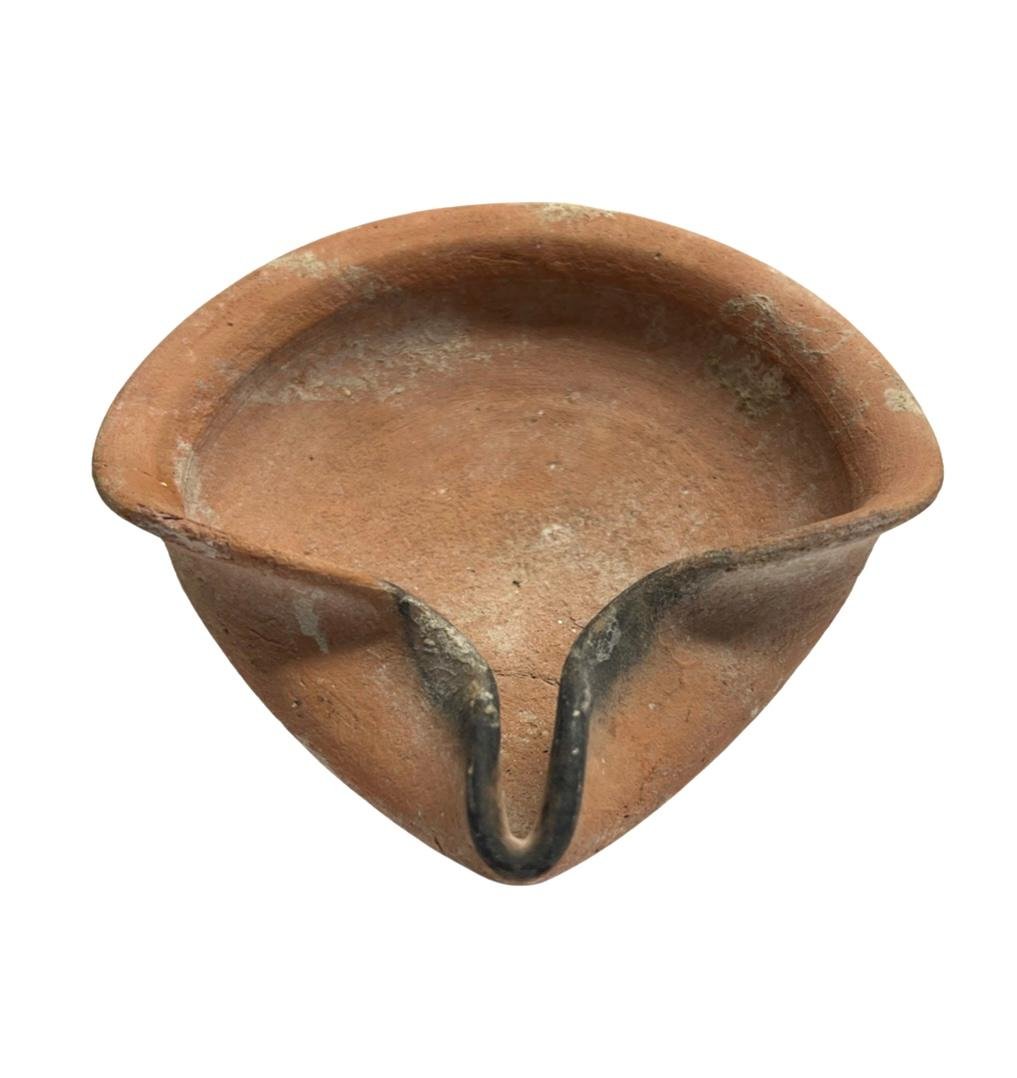 Ancient Near East, Holy Land Iron Age, ca. 1200 BC .: Ancient Near East, Holy Land Iron Age, ca. 1200 BC 1000 BCE, his wheel made orange clay oil lamp with round base is pinched to form the spout, superb example with nice encrustation. Size: 13 cm x 13 c