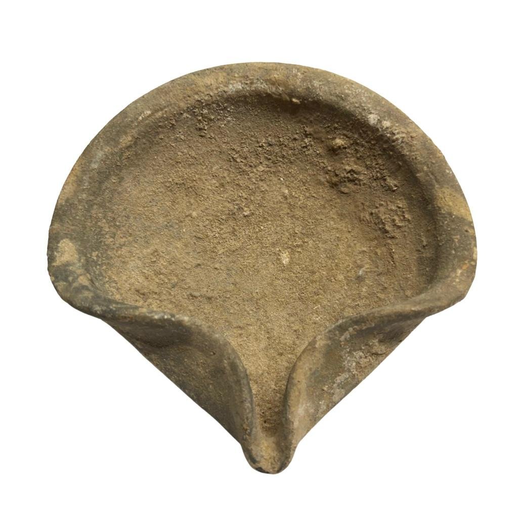 Ancient Near East, Holy Land Iron Age, ca. 1200 BC .: Ancient Near East, Holy Land Iron Age, ca. 1200 BC 1000 BCE, his wheel made orange clay oil lamp with round base is pinched to form the spout, superb example with nice encrustation. Size: 12.5 cm x 13