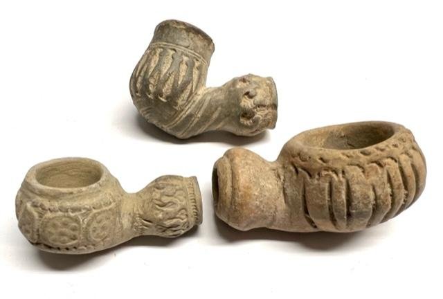 A group of 3 Islamic Clay Pipes. (1 of 3)