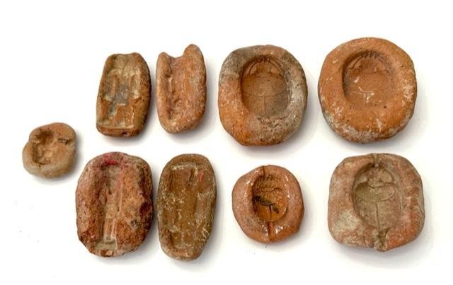 A group of 9 Egyptian Clay Moulds. (1 of 4)
