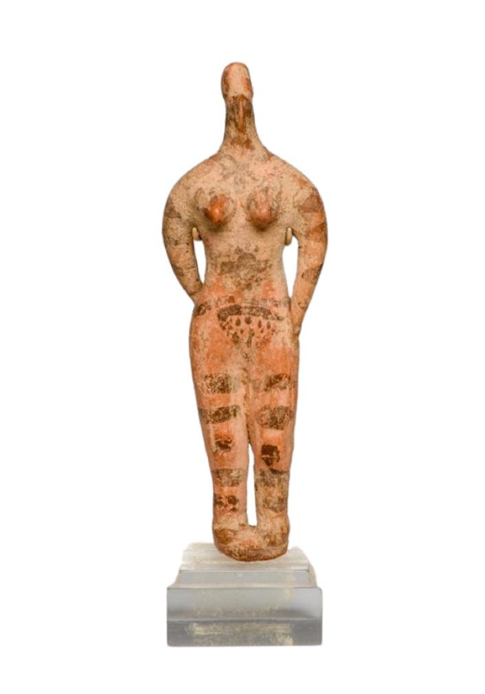 Tel Halaf Standing Female Figure.: Tel Halaf Standing Female Figure, Ca. 2nd-1st millennium B.C. Salmon color solid pottery standing female figure depicted with pointy breasts, one handheld to hip and the other on her buttocks. Black p