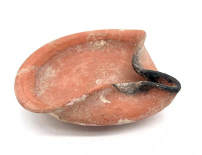 Ancient Near East, Holy Land Iron Age, ca. 1200 BC .: Ancient Near East, Holy Land Iron Age, ca. 1200 BC 1000 BCE, his wheel made orange clay oil lamp with round base is pinched to form the spout, superb example with nice encrustation. Size: 13 cm x 13 c