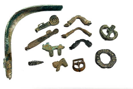 Lot of 12 Ancient Roman Bronze buckles and artifact.: Lot of 12 Ancient Roman Bronze buckles and artifact, circa 100AD-400 size: 12 cm - 2.5 cm.