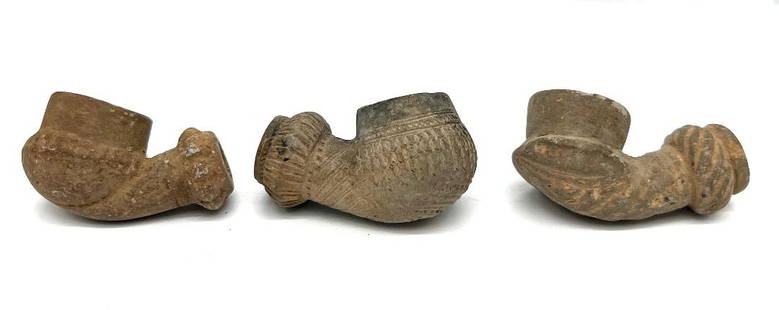 A group of 3 Islamic Clay Pipes: A group of 3 Islamic Clay Pipes,17to 18 century AD Size: approximately 5.5 cm