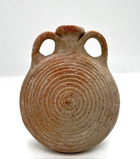 Roman / Holy land terracotta pilgrim's flask: Roman terracotta pilgrim's flask, c. 200 - 400 AD, the body lentoid in shape with two handles and a spout. On either side of the body. Size: 14cm x 11 cm Provenance: private NJ collector