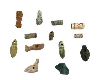 Lot of 12 Near Eastern/Egyptian faience Amulets.: Lot of 12 Near Eastern/Egyptian faience Amulets,.Circa 600 BC - 400 BC. Fine lot of small mixed faience amulets with a hole through for suspension. Ex Private NJ collection. Size: 2 cm -1 cm