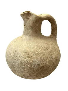 Ancient Roman Trefoil Pottery Jug.: Ancient Roman Trefoil Pottery Jug, Circa 1st to 3rd century AD with strap handle and trefoil spout. nice patina. Size: 13 cm x 10 cm Ex private NY collection