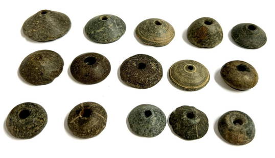 Lot of 15 Ancient Roman Stone Spindle Whorls: Lot of 15 Ancient Roman Stone Spindle , 100BC - 100AD collection of stone Spindle Whorls of different shape and form. Size :3.8 cm - 1.5 cm Provenance: Ex NY collector.