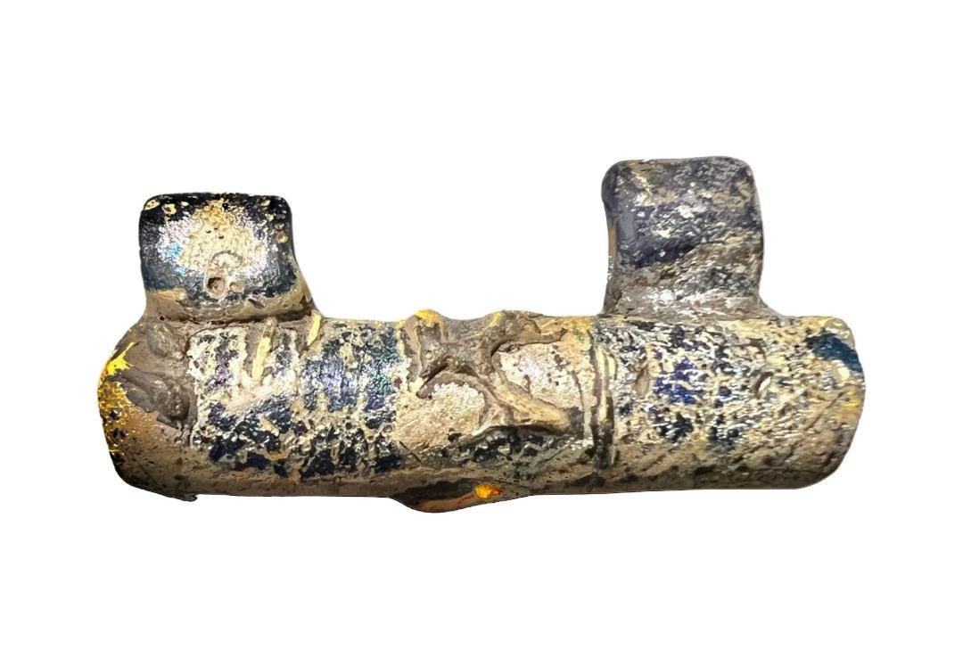 Roman Mosaic Glass Bead.: Roman Mosaic Glass Bead, 2nd-4th century AD. A large glass bead covered with a beautiful iridescent patina. Size: 3.5 cm, Provenance: Ex NY private collection.