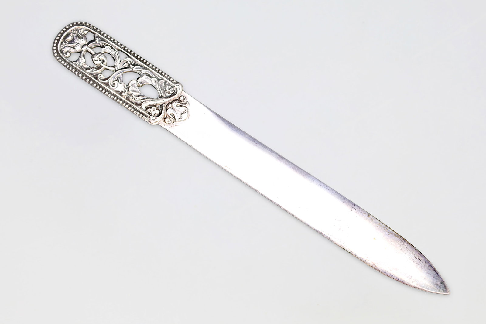 Scandinavian 830 Silver Letter Opener, Brodene Lohne, Norway, Mid Century Modern: Early Half Of The XX Century, Brodrene Lohne Norwegian Pattern 146 On A Letter Opener Knife Scandinavian 830s Silver And Hallmarked. Art Nouveau Floral Scroll Cut Out Ornaments In An Interlocking Vine