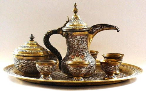 RARE Islamic Syrian Silver Inlaid Coff set.: Antique Ottoman Islamic Silver and Inlaid Coffee SetLate 19th century ,Decorated with geometric patterns a very beautiful .The measurements are as followsTRAY : Diameter 41 cm.THE POT: Height 23cm .EA