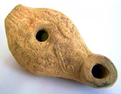 Ancient Roman clay oil lamp: Roman clay oil lamp, 100 AD-300 AD , nice decoration and patina, intact .Size : 8.5 cm x 4.8 cm