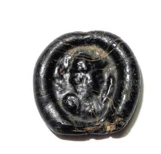 Roman Empire molded glass Amulet: Roman Empire molded glass Token or Amulet ,circa 1st to 3th century AD . Intact. Size: 2.5 cm. Provenance: New York Private Collector.