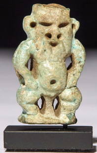 Ancient Egyptian Faience Bes .: Ancient Egyptian Turquoise Faience Bes Amulet, Circa 630 BC - 200 BC, Size: 5 x 3 cmProvenance: Bob Brand and Liz Werthan.