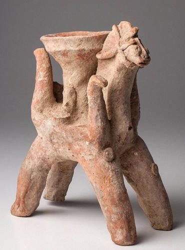 Ancient Amlash Clay offering Bowl on Horseback .: Ancient Amlash Clay offering Bowl on Horseback ,Ca. 1st millennium B.C. olid natural buff pottery figural votive horse standing on four arched legs with a central, high stemmed, offering bowl in the c
