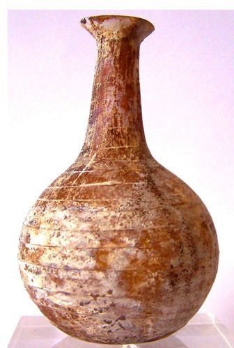 Beautiful Ancient Roman glass Flask.: Roman glass flask, Circa 2nd century AD. nice color and iridescent patina ,intact. Provenance: Ex NJ private collection ,Size : 11cm x 6cm .