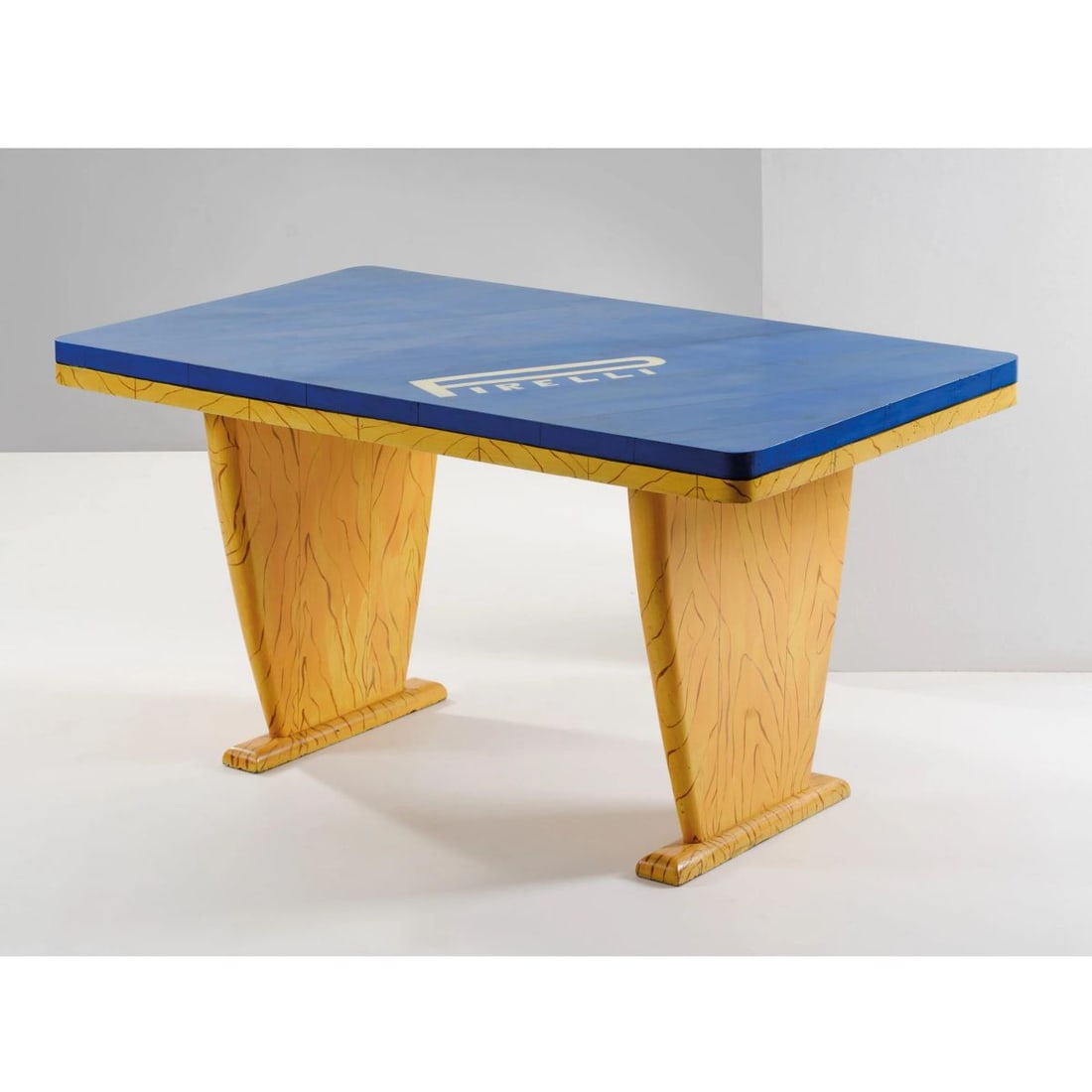 Lapo Binazzi: Lapo Binazzi (Firenze, 1943) TABLE, BLUE AND YELLOW LACQUERED WOODEN STRUCTURE TAVOLO in legno laccato nei toni del giallo e blu Produzione Italia, 1981 Firma dell’autore sul lato cm H80x