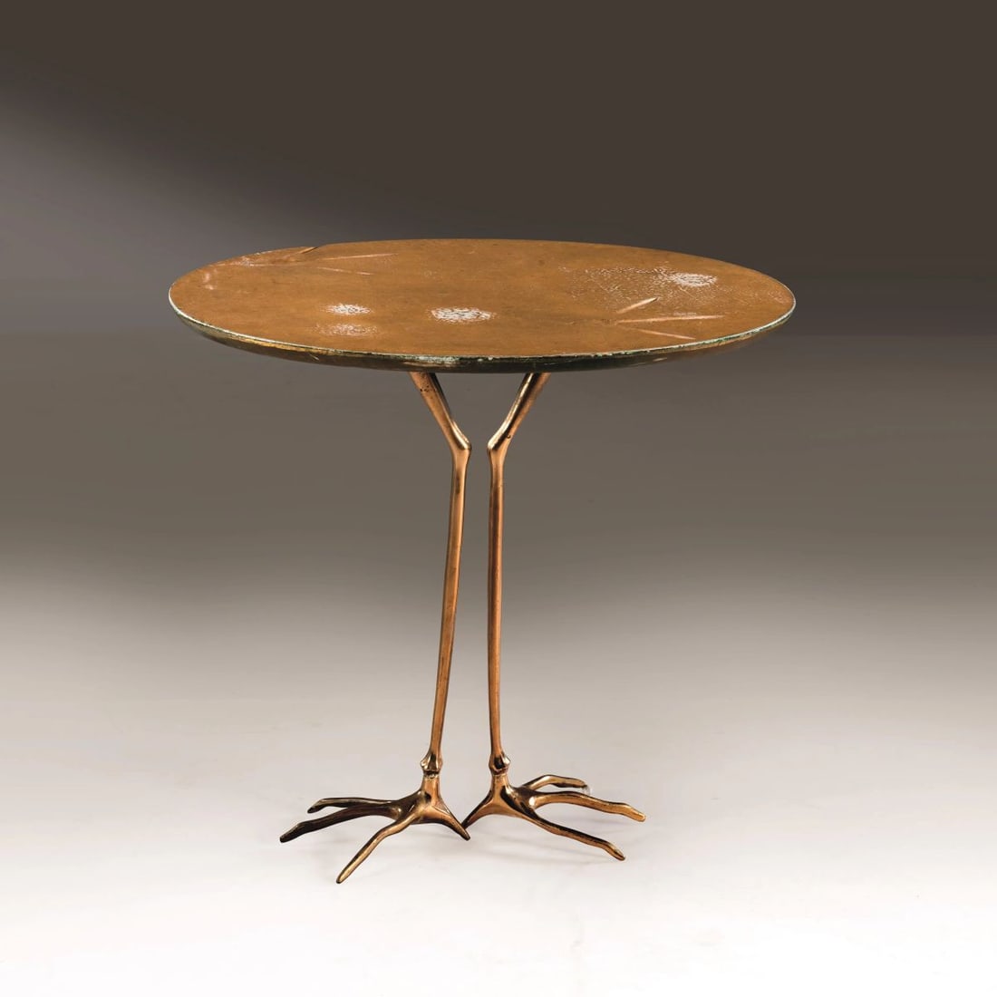 Meret Oppenheim: Meret Oppenheim (Berlino, 1913 - Basilea, 1985) A «TRACCIA» SMALL TABLE, BRONZE STRUCTURE AND GOLD LEAF TOP TAVOLINO MODELLO TRACCIA struttura in bronzo e piano in legno