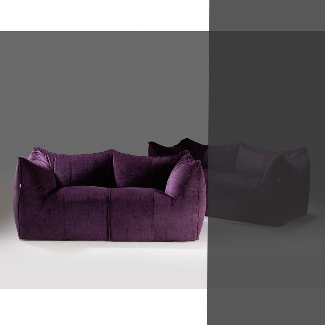 Mario Bellini: Mario Bellini (Milano, 1935) «LE BAMBOLE» SOFA, PURPLE FABRIC UPHOLSTERY DIVANO MODELLO LE BAMBOLE imbottito e rivestito in tessuto nei toni del viola Produzione