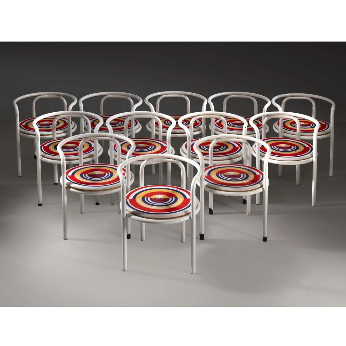 Gae Aulenti: Gae Aulenti (Palazzolo dello Stella, 1927 - Milano, 2012) TWELVE ARMCHAIRS FROM THE «LOCUS SOLUS» SERIES, WHITE LACQUERED METAL STRUCTURE DODICI POLTRONCINE DELLA SERIE