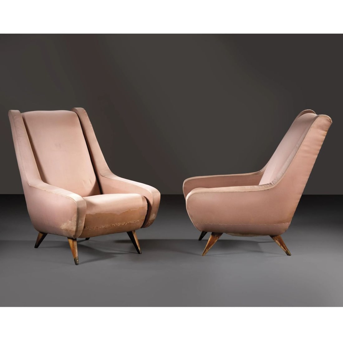 A COUPLE OF ARMCHAIRS: A COUPLE OF ARMCHAIRS, WOODEN STRUCTURE, PINK FABRIC UPHOLSTERED COPPIA DI POLTRONE struttura in legno, rivestite in tessuto nei toni del rosa Produzione Italia, 1960 circa cm H98xL73xP100