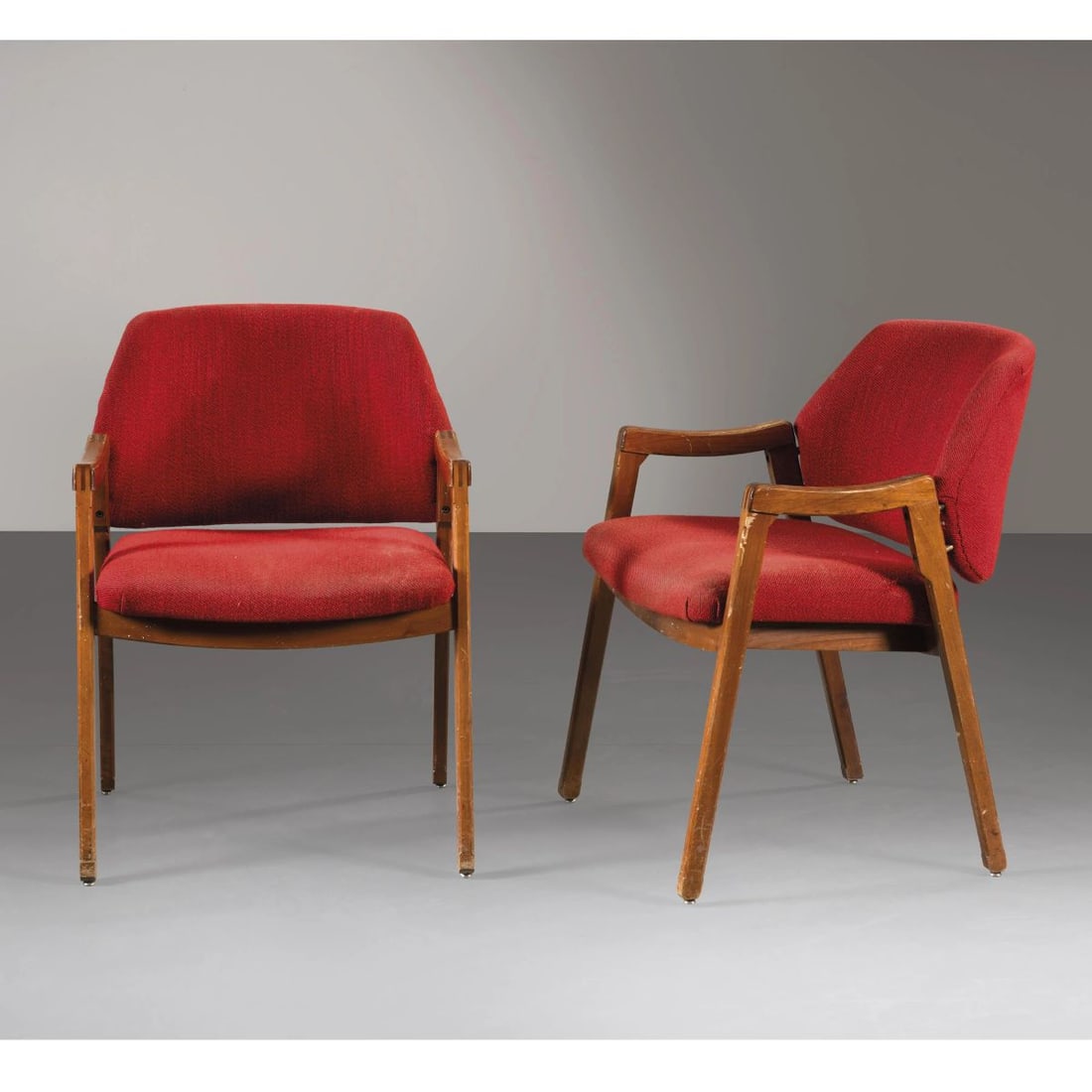 Ico Parisi: Ico Parisi (Palermo, 1916 - Como, 1996) TWO ARMCHAIRS, WOODEN STRUCTURE, RED FABRIC UPHOLSTERED DUE POLTRONE MODELLO 814 struttura in legno, imbottite e rivestite in tessuto nei toni del rosso