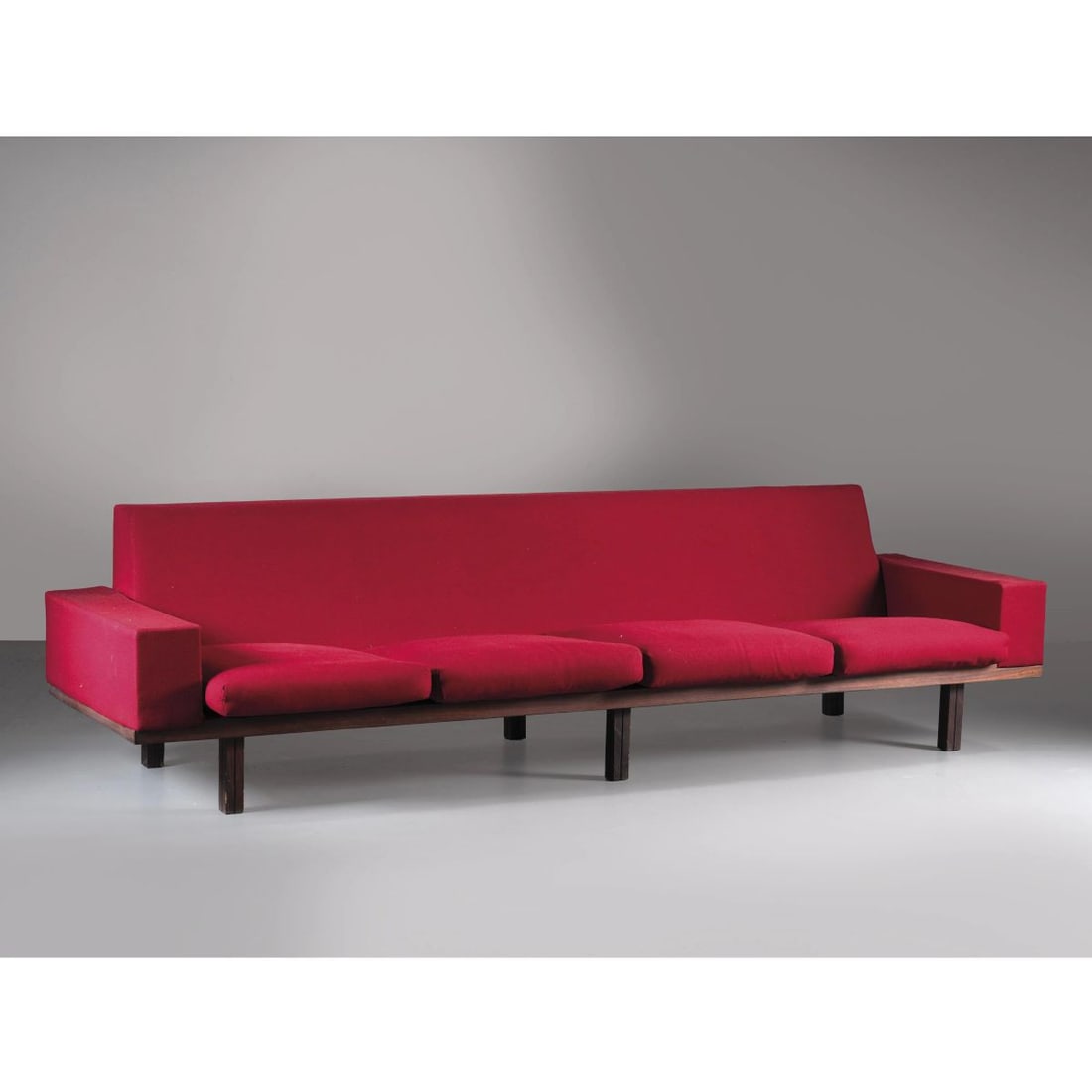 SOFA: SOFA, WOODEN STRUCTURE, RED FABRIC UPHOLSTERED DIVANO struttura in legno, imbottito e rivestito in tessuto nei toni del rosso Produzione Italia, 1960 circa cm H70xL266xP80