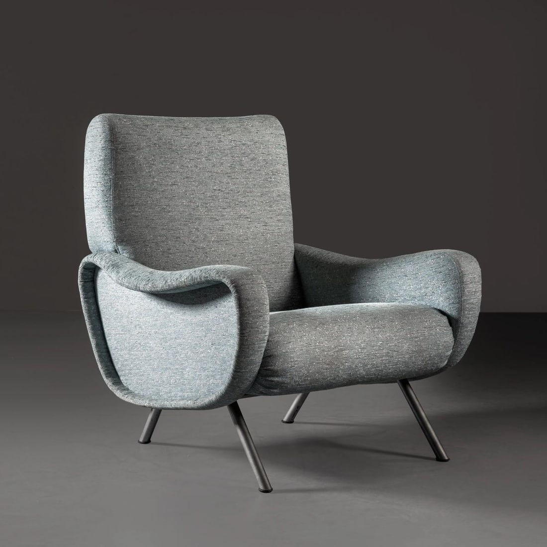 Marco Zanuso: Marco Zanuso (Milano, 1916 – 2001) LADY ARMCHAIR POLTRONA MODELLO LADY imbottita e rivestita in tessuto nei toni del verde Produzione Cassina, Italia, 1970 circa cm H83xL74xP77 Bibliografia di