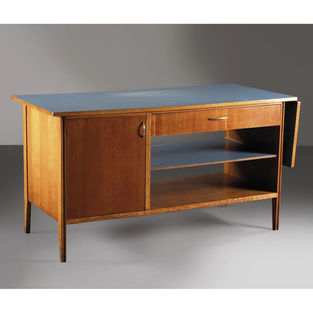 SCRIVANIA: SCRIVANIA in legno, ripiano in laminato nei toni del blu Produzione Italia 1950 circa chiuso cm H80xL149xP69 aperto cm H80xL189xP69 WOODEN DESK, BLUE LAMINATED WOODEN TOP 