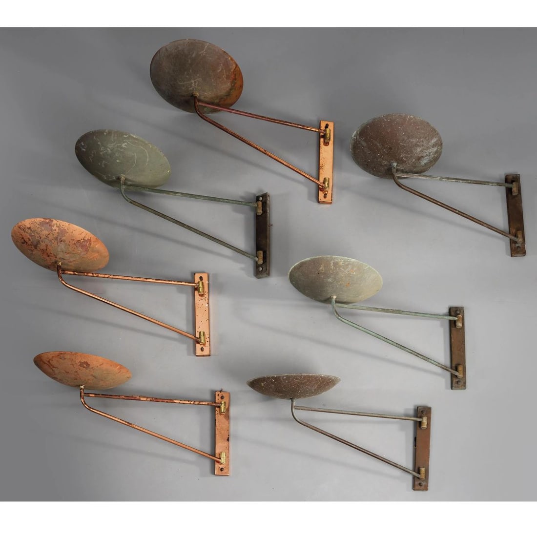 SETTE APPLIQUES: SETTE APPLIQUES in rame Produzione Italia, 1960 circa cm H30xL75xP32 SEVEN COPPER WALL LAMPS 
