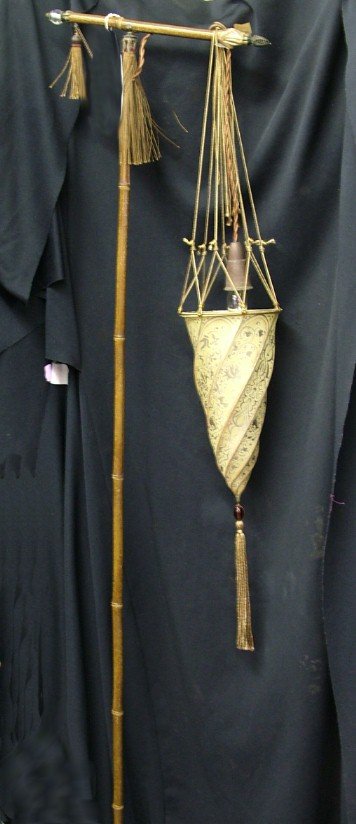 Bamboo Stick Floor Lamp with Fortuni: Cone Shaped with a Twist Hanging Fabric Shade